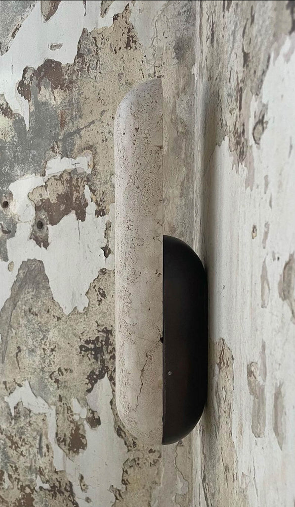 Studio Henry Wilson Classico Travertine with Blackened Cast Bronze Pill Sconce